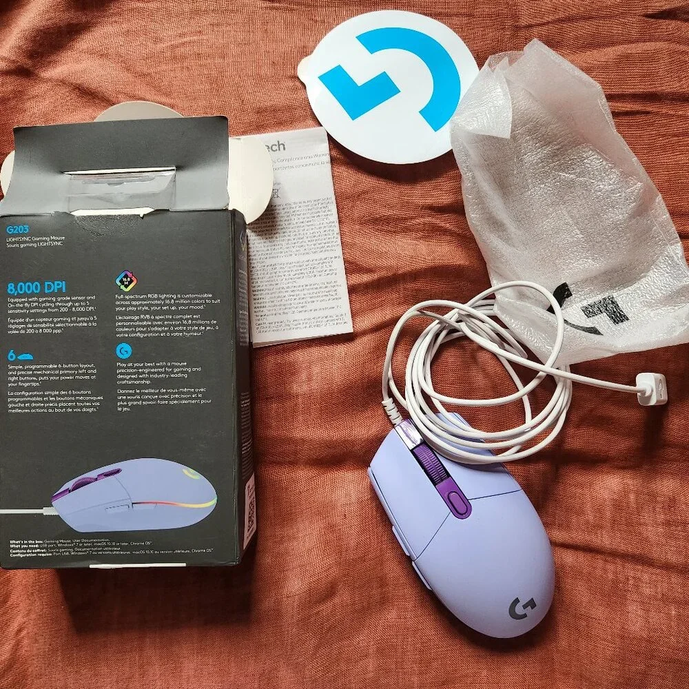 Logitech G203 LIGHTSYNC gaming mouse Not working Mouse is like new but cat chew